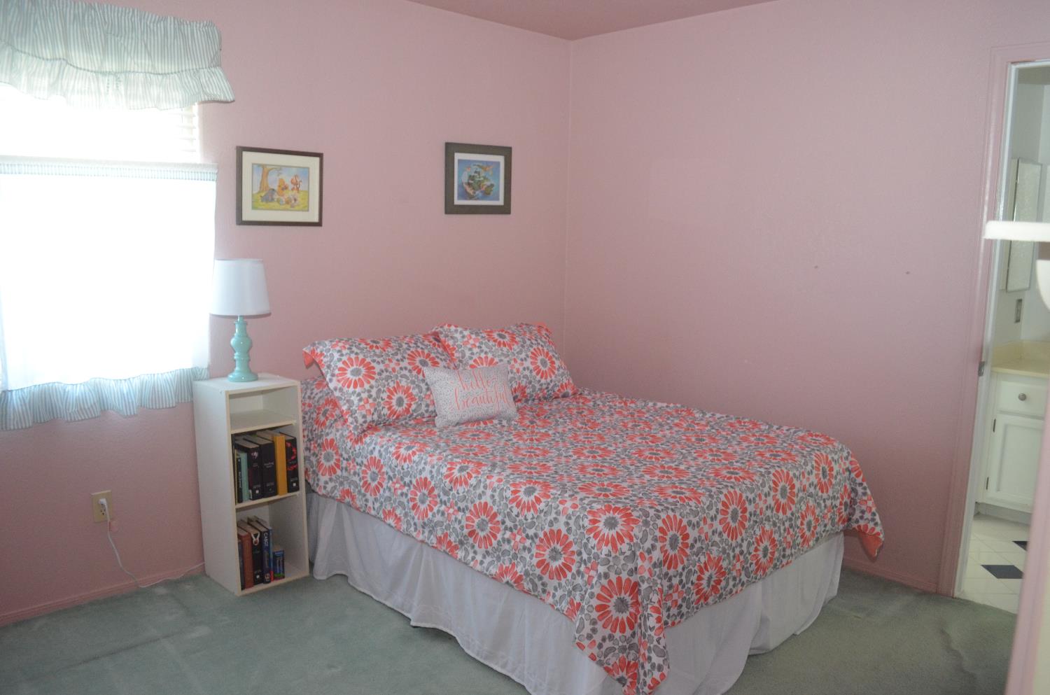 8392 Red Fox Way Elk Grove, CA 95758 - Photo 22 of 30 a bedroom with a bed and a tv