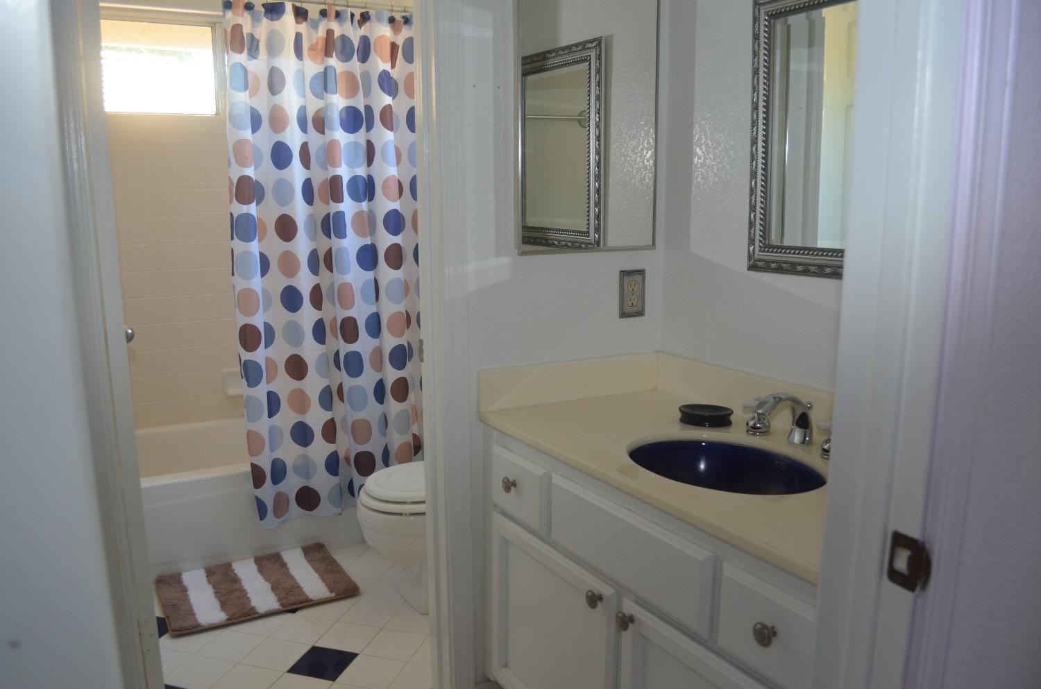 8392 Red Fox Way Elk Grove, CA 95758 - Photo 24 of 30 a bathroom with a sink toilet and shower