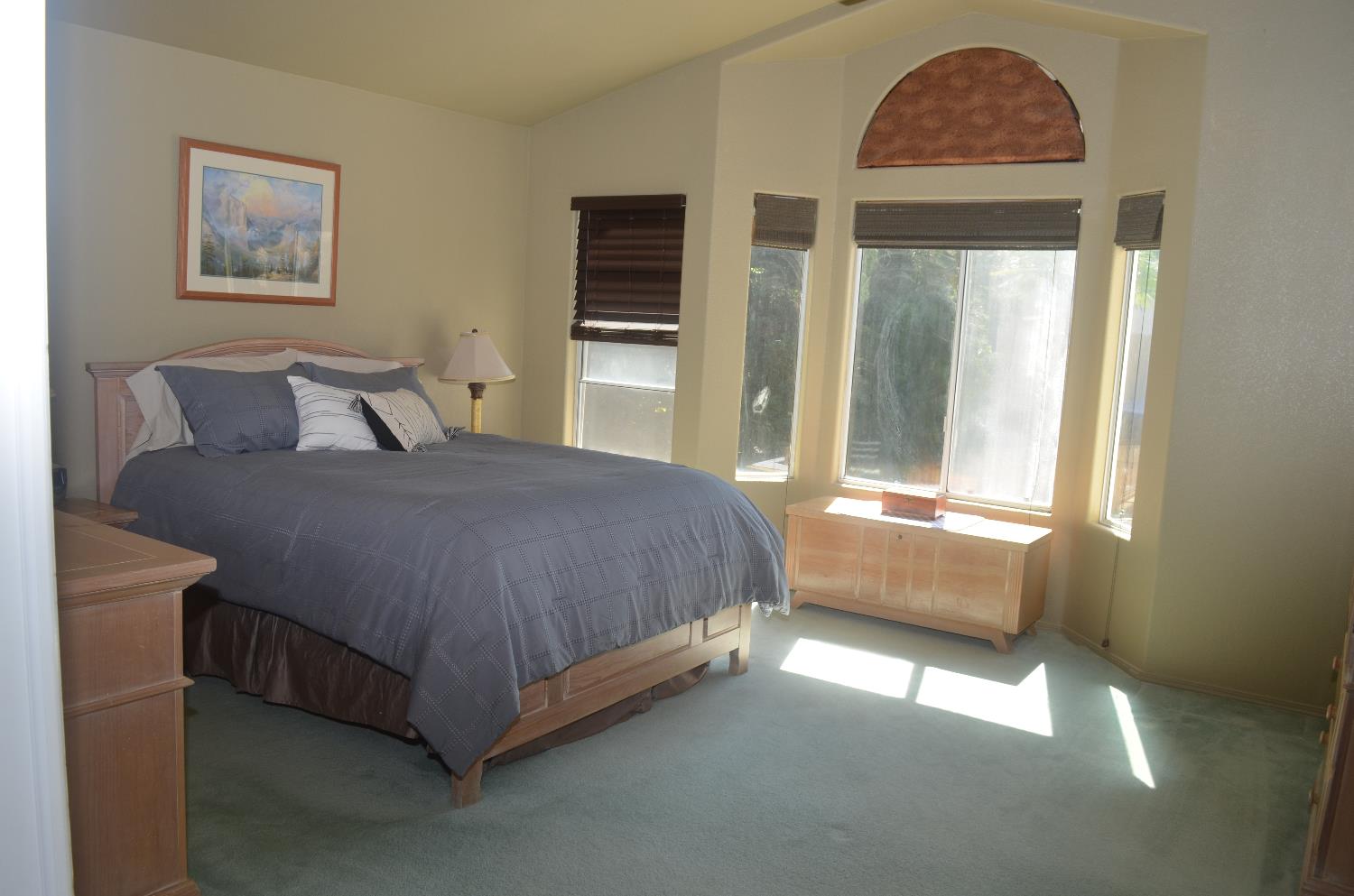 8392 Red Fox Way Elk Grove, CA 95758 - Photo 25 of 30 a bedroom with a bed and a painting on the wall