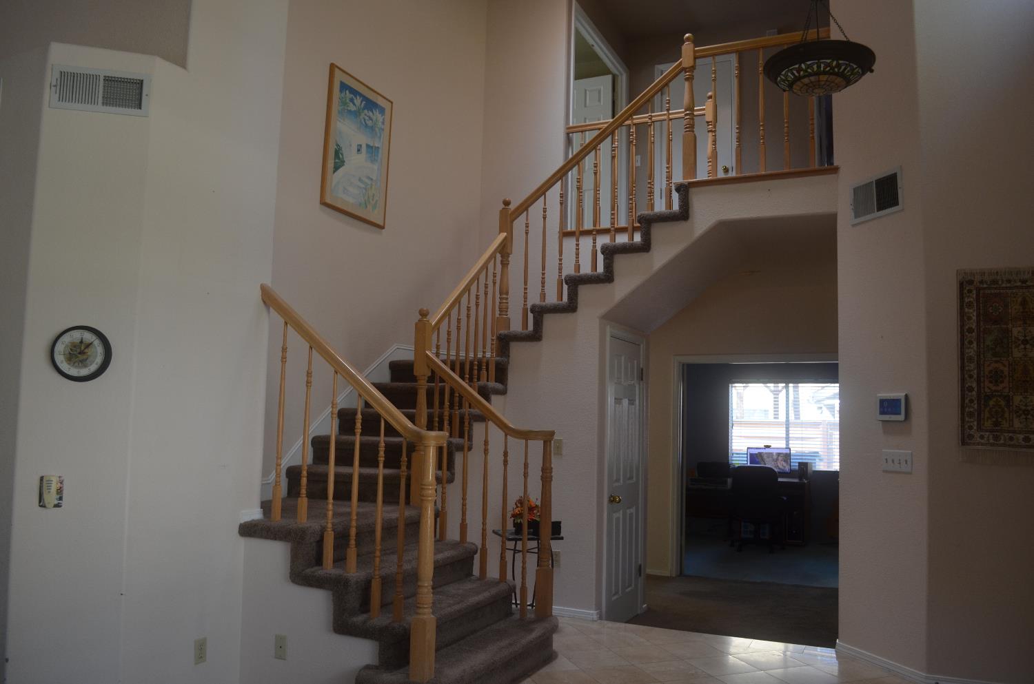 8392 Red Fox Way Elk Grove, CA 95758 - Photo 4 of 30 a view of entryway and hall with wooden floor
