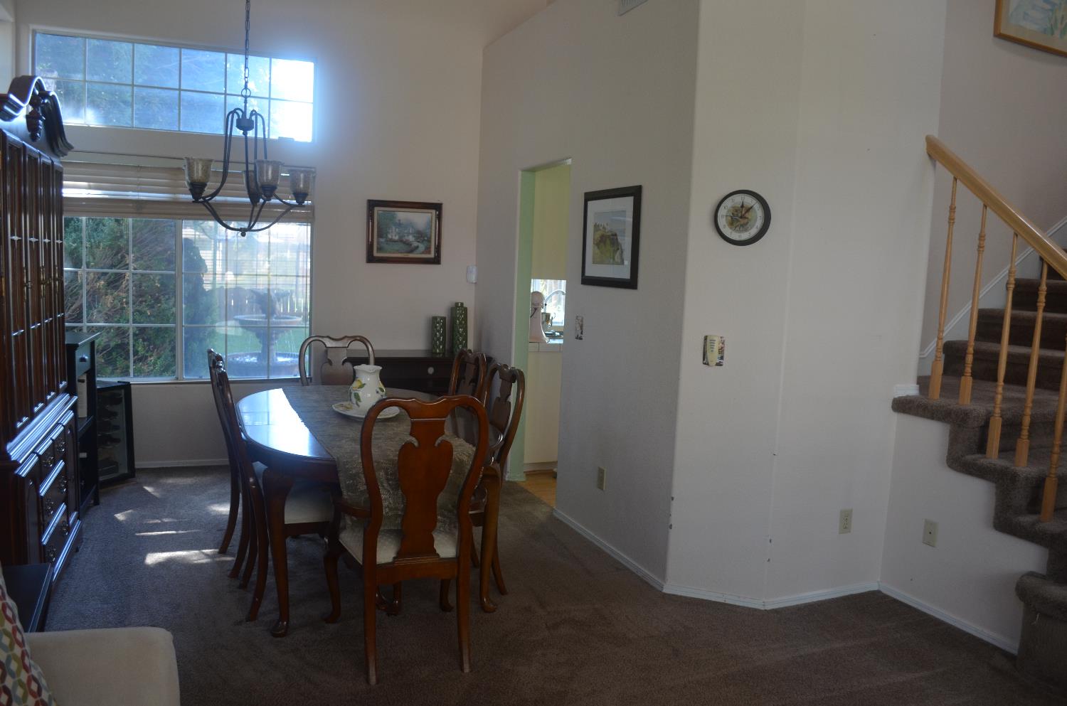 8392 Red Fox Way Elk Grove, CA 95758 - Photo 5 of 30 a view of a dining room with furniture
