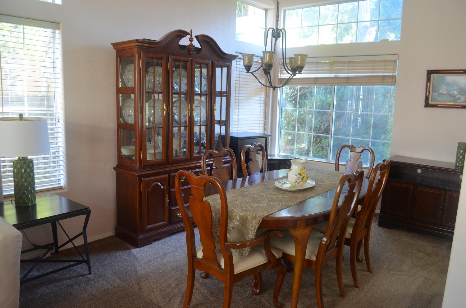 8392 Red Fox Way Elk Grove, CA 95758 - Photo 7 of 30 a view of a dining room with furniture window and outside view
