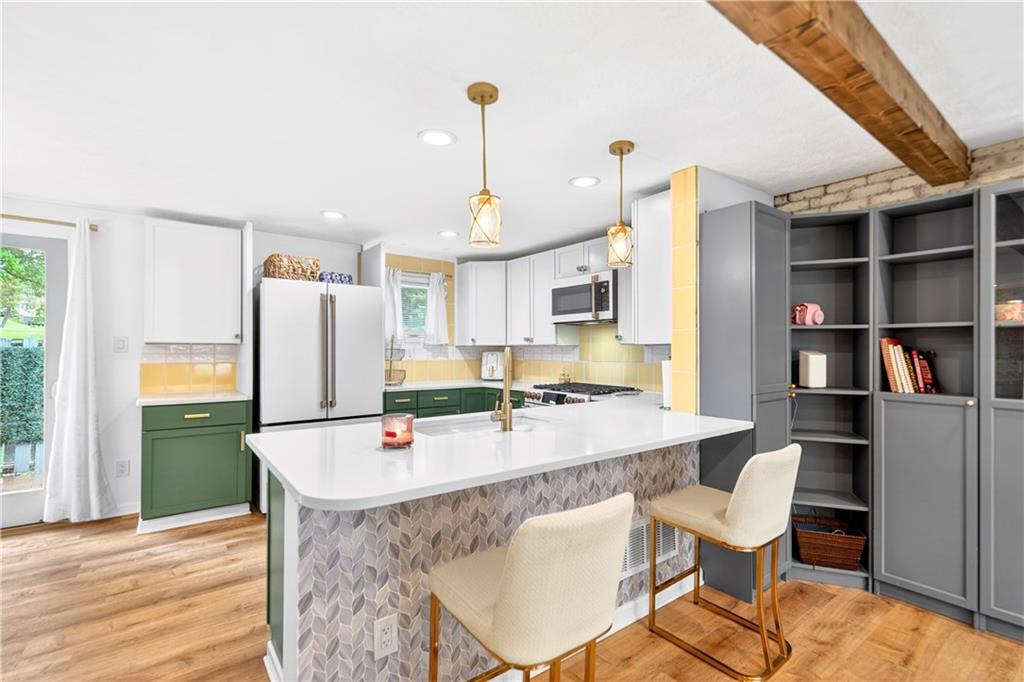 532 Hunters Path Road Bridgeville, PA 15017 - Photo 5 of 44 Kitchen near Family room showing built in shelving