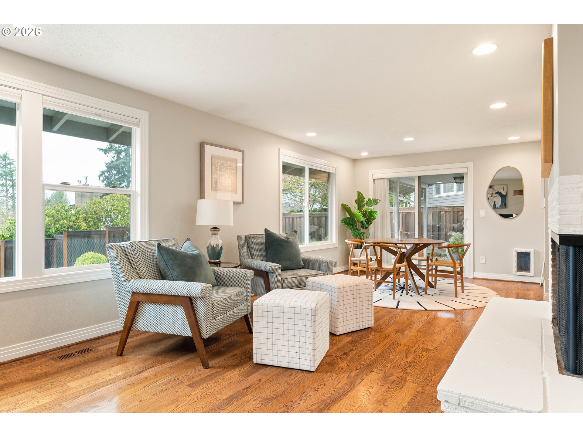 2125 Southwest Warwick Avenue Portland, OR 97225 - Photo 11 of 40 a living room with furniture and wooden floor
