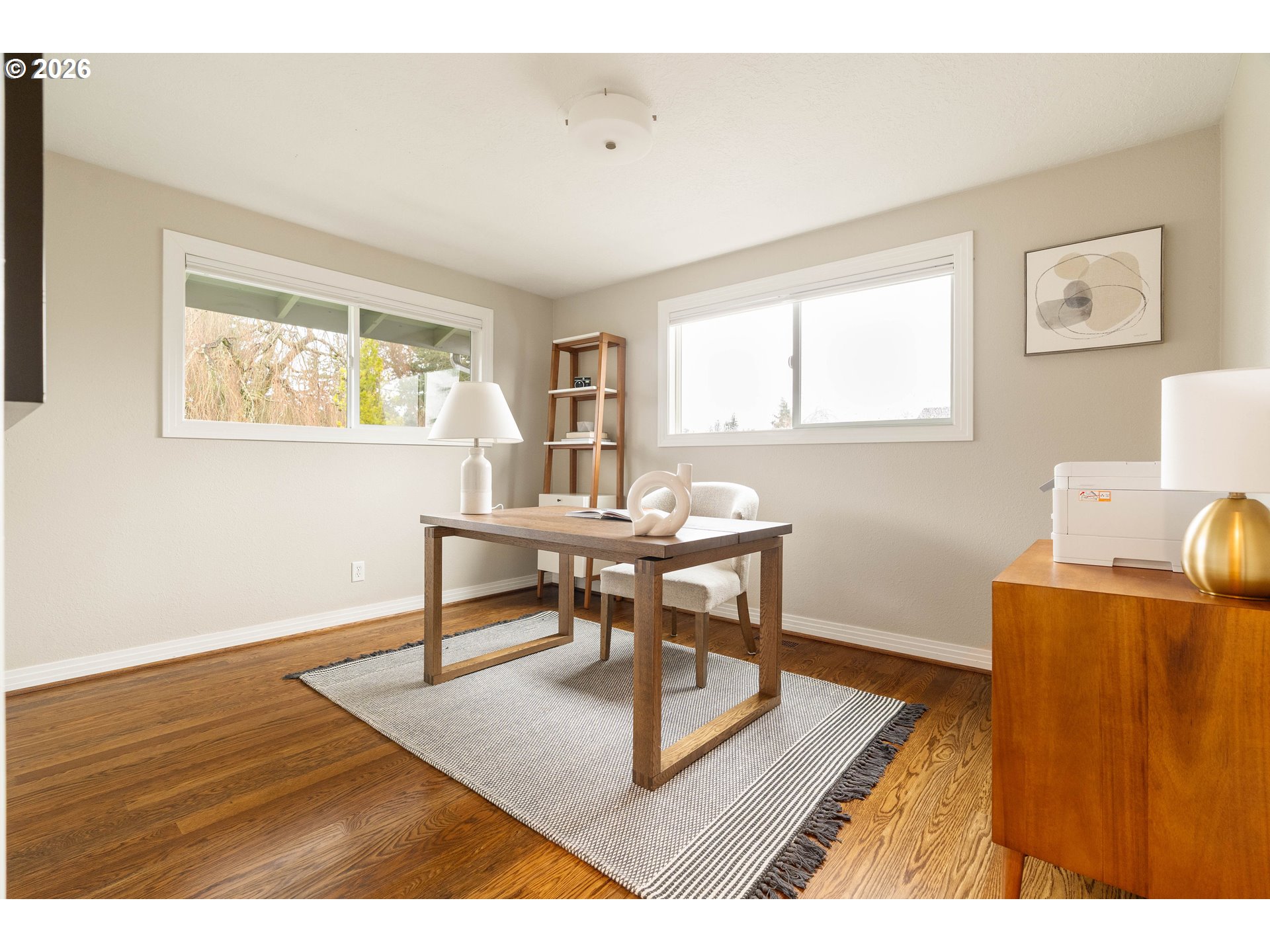 2125 Southwest Warwick Avenue Portland, OR 97225 - Photo 16 of 40 a living room with furniture a window and a table