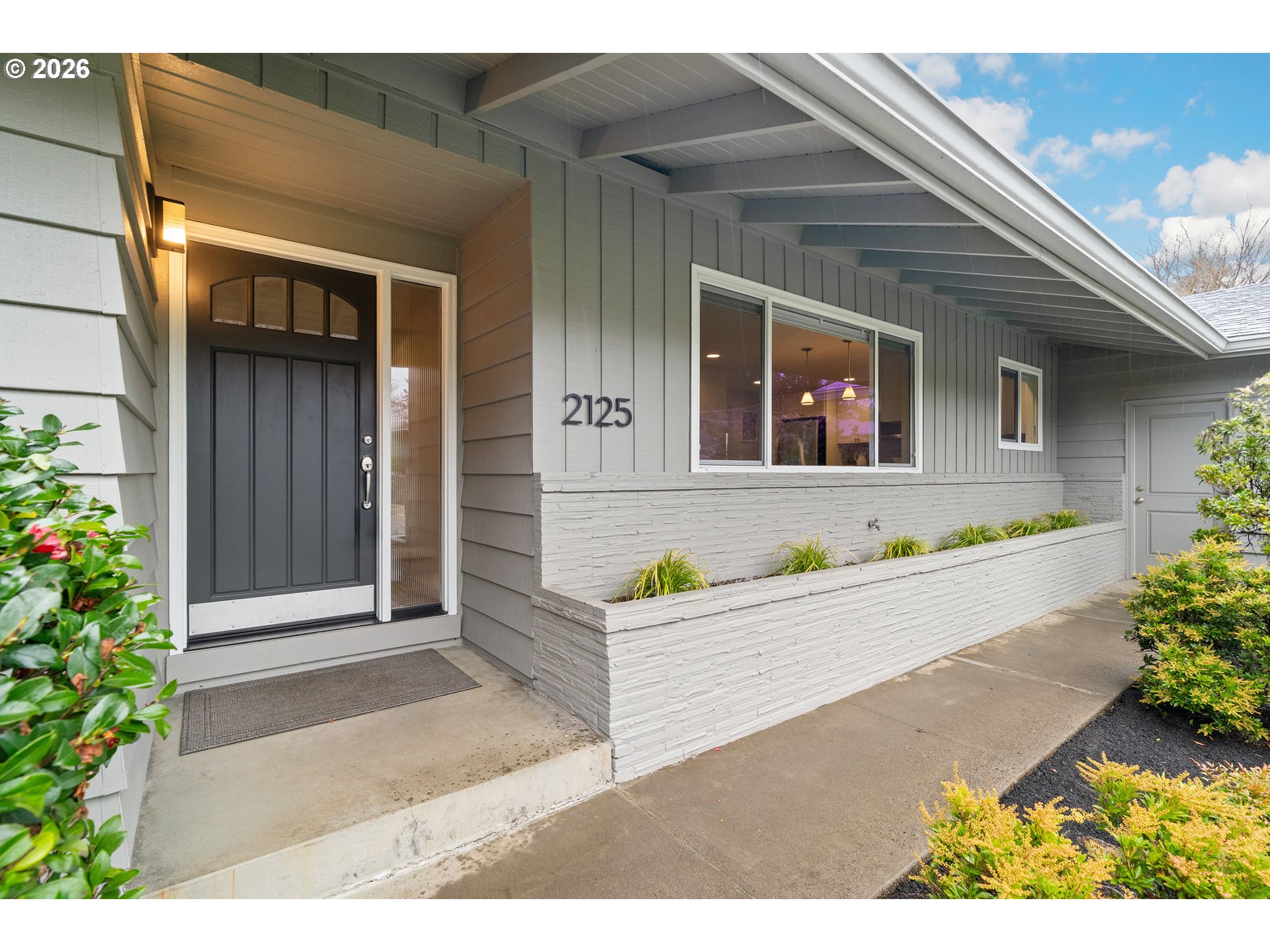 2125 Southwest Warwick Avenue Portland, OR 97225 - Photo 2 of 40 a front view of house with yard