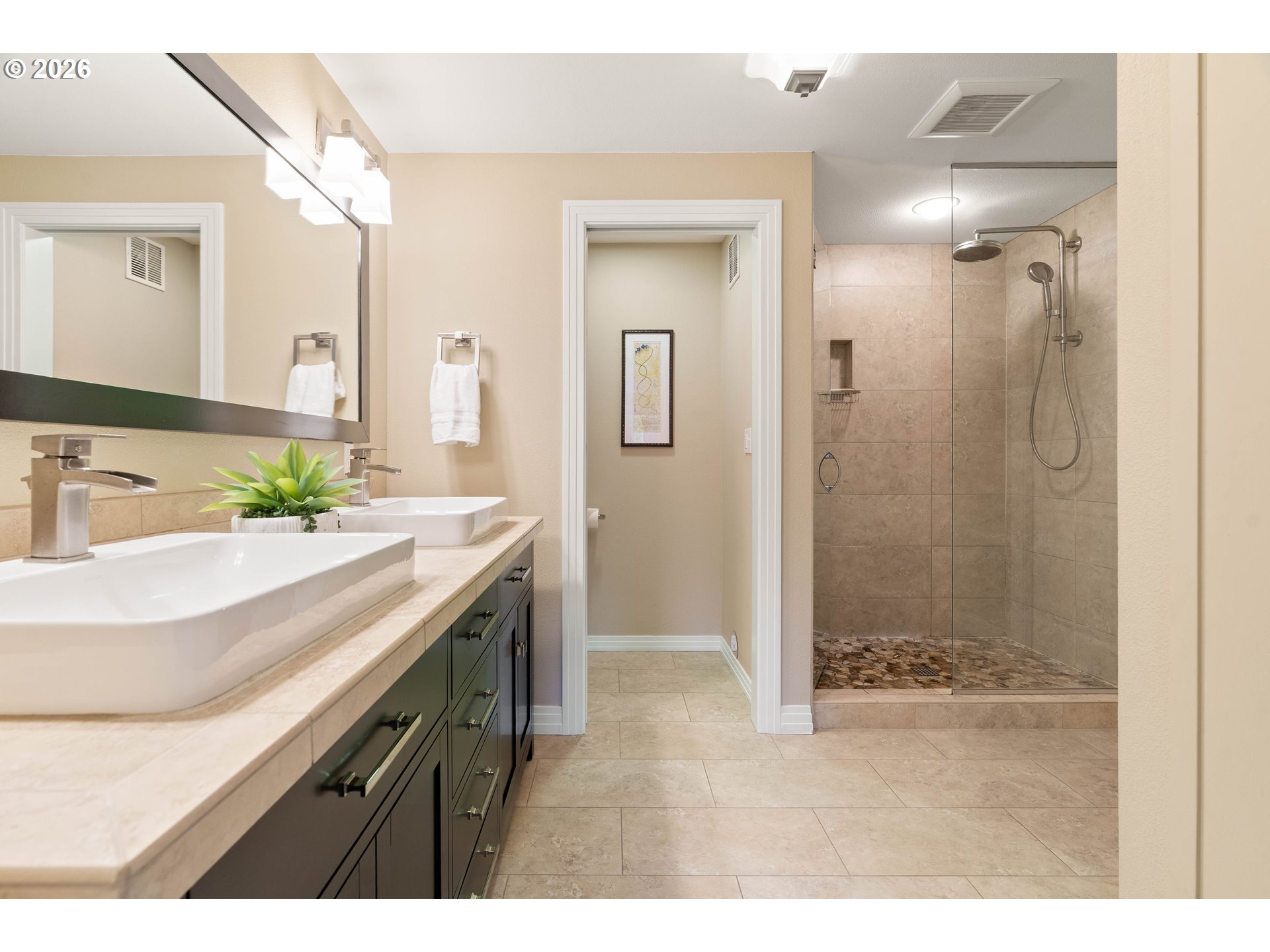 2125 Southwest Warwick Avenue Portland, OR 97225 - Photo 26 of 40 a bathroom with a granite countertop sink mirror and double