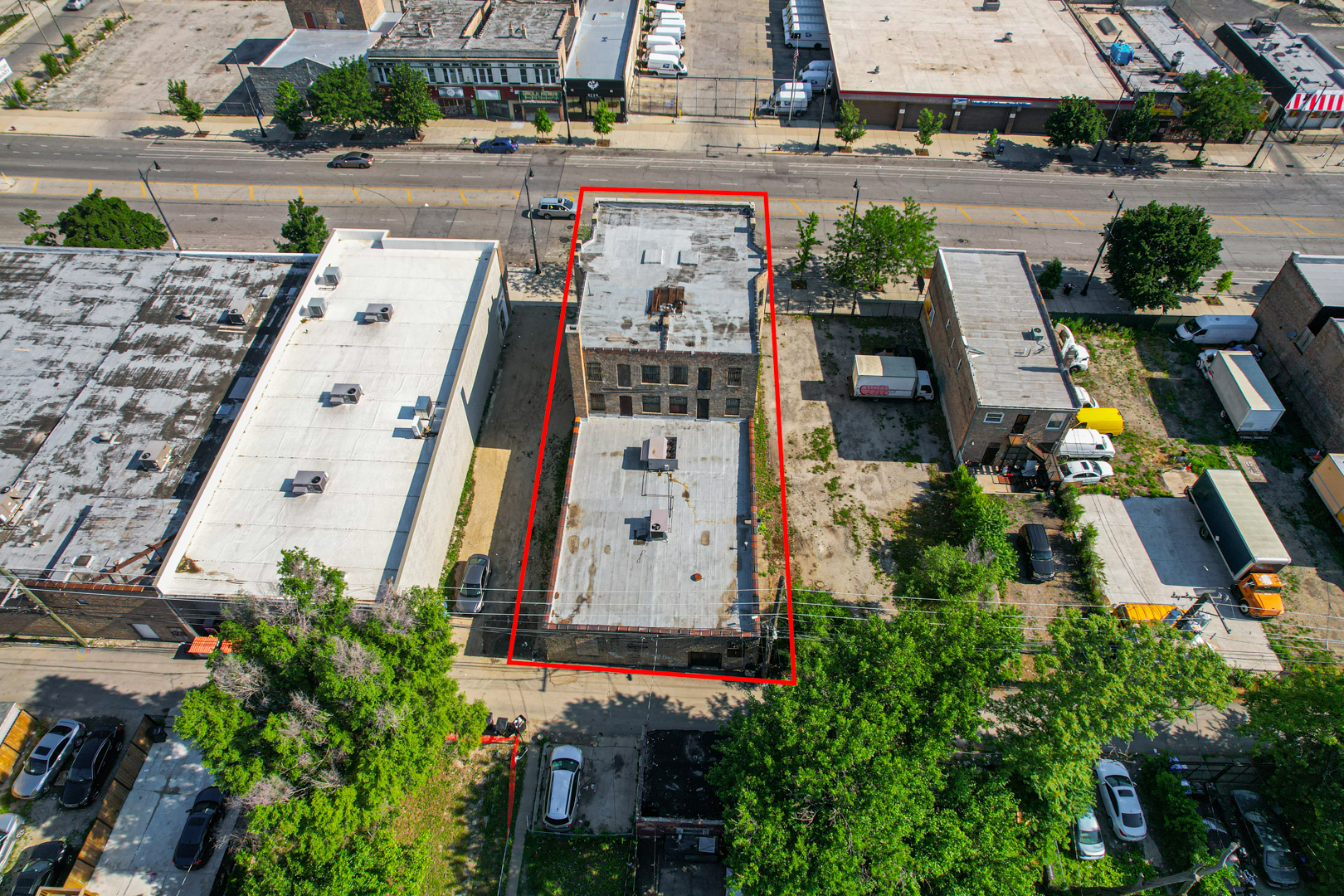 4231 West Madison Street Chicago, IL 60624 - Photo 13 of 19 an aerial view of multiple houses with yard