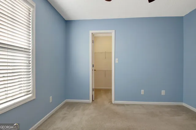 a view of backyard with green space