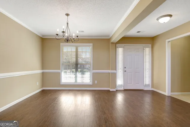 a living room with a fireplace and a fireplace