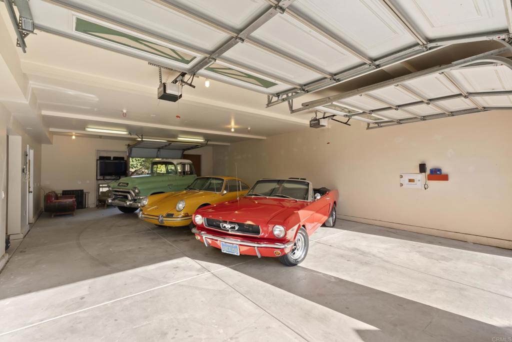 233 Cole Ranch Road Encinitas, CA 92024 - Photo 15 of 25 a car parked in a garage