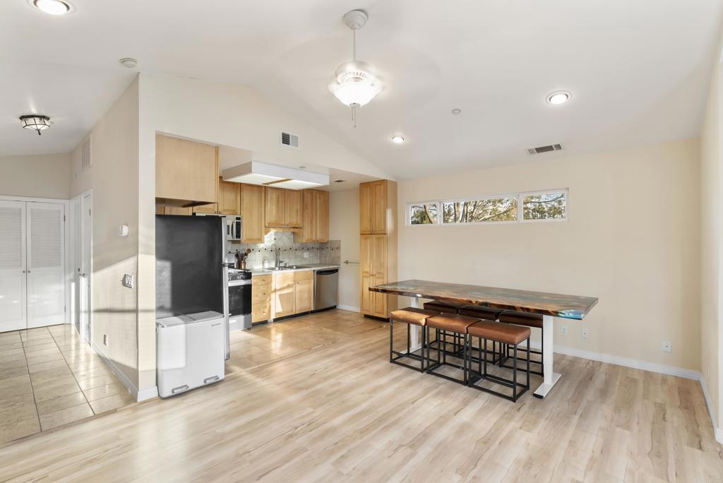 233 Cole Ranch Road Encinitas, CA 92024 - Photo 19 of 25 a kitchen with stainless steel appliances a refrigerator and a stove top oven