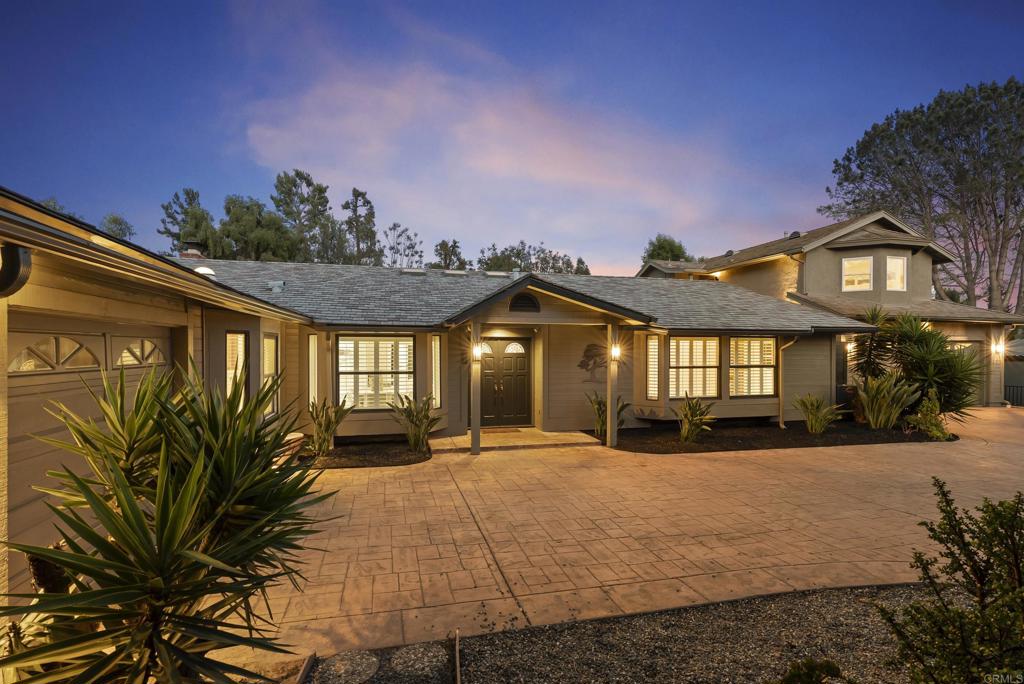 233 Cole Ranch Road Encinitas, CA 92024 - Photo 23 of 25 a front view of a house with a yard