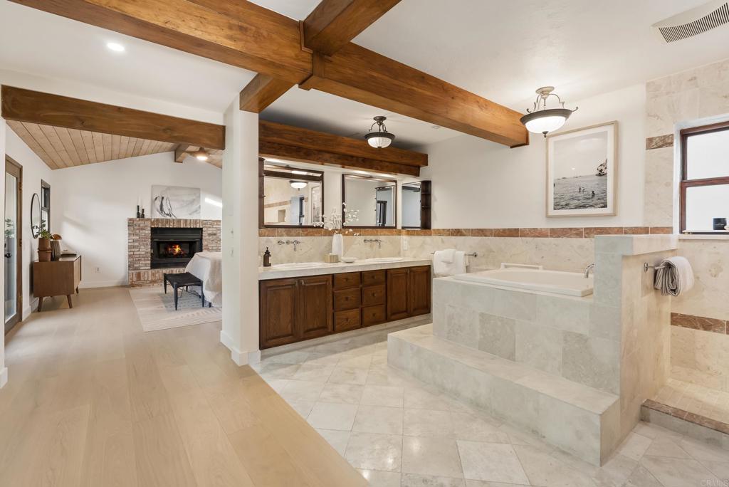 233 Cole Ranch Road Encinitas, CA 92024 - Photo 10 of 25 a large white kitchen with a large window