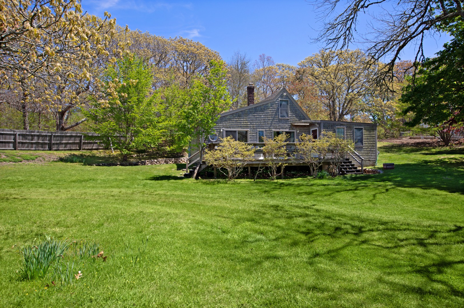 10 Abel's Neck Road Chilmark, MA 02535 - Photo 15 of 20 a front view of a house with garden