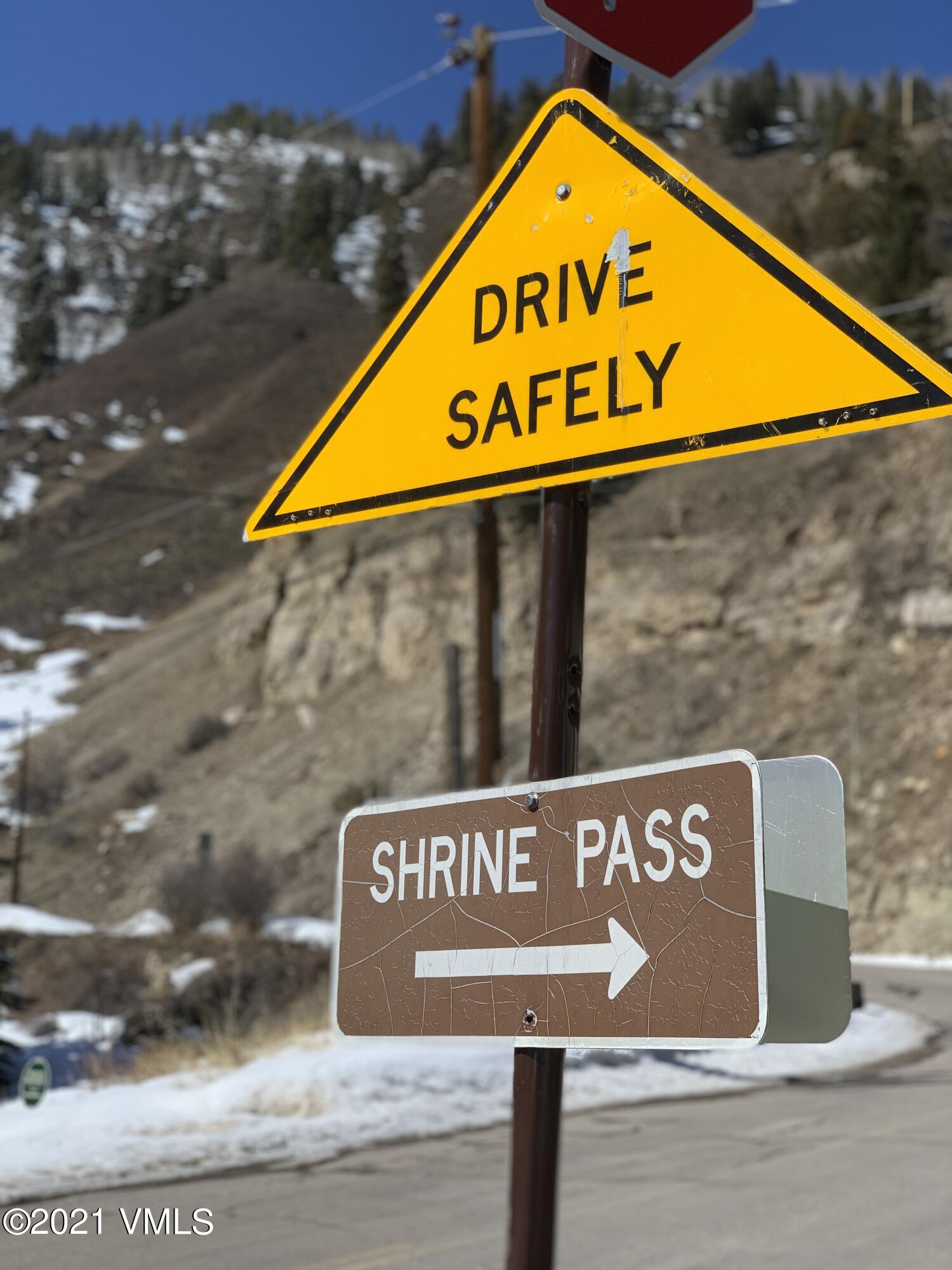 497 Eagle Street Red Cliff, CO 81649 - Photo 11 of 17 a close up of a street sign
