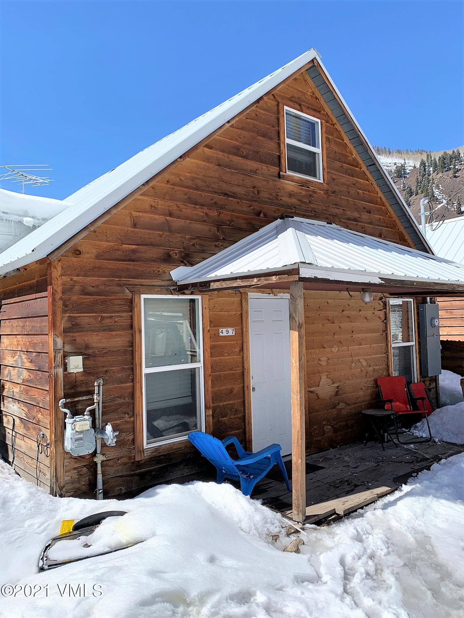 497 Eagle Street Red Cliff, CO 81649 - Photo 6 of 17 a front view of a house