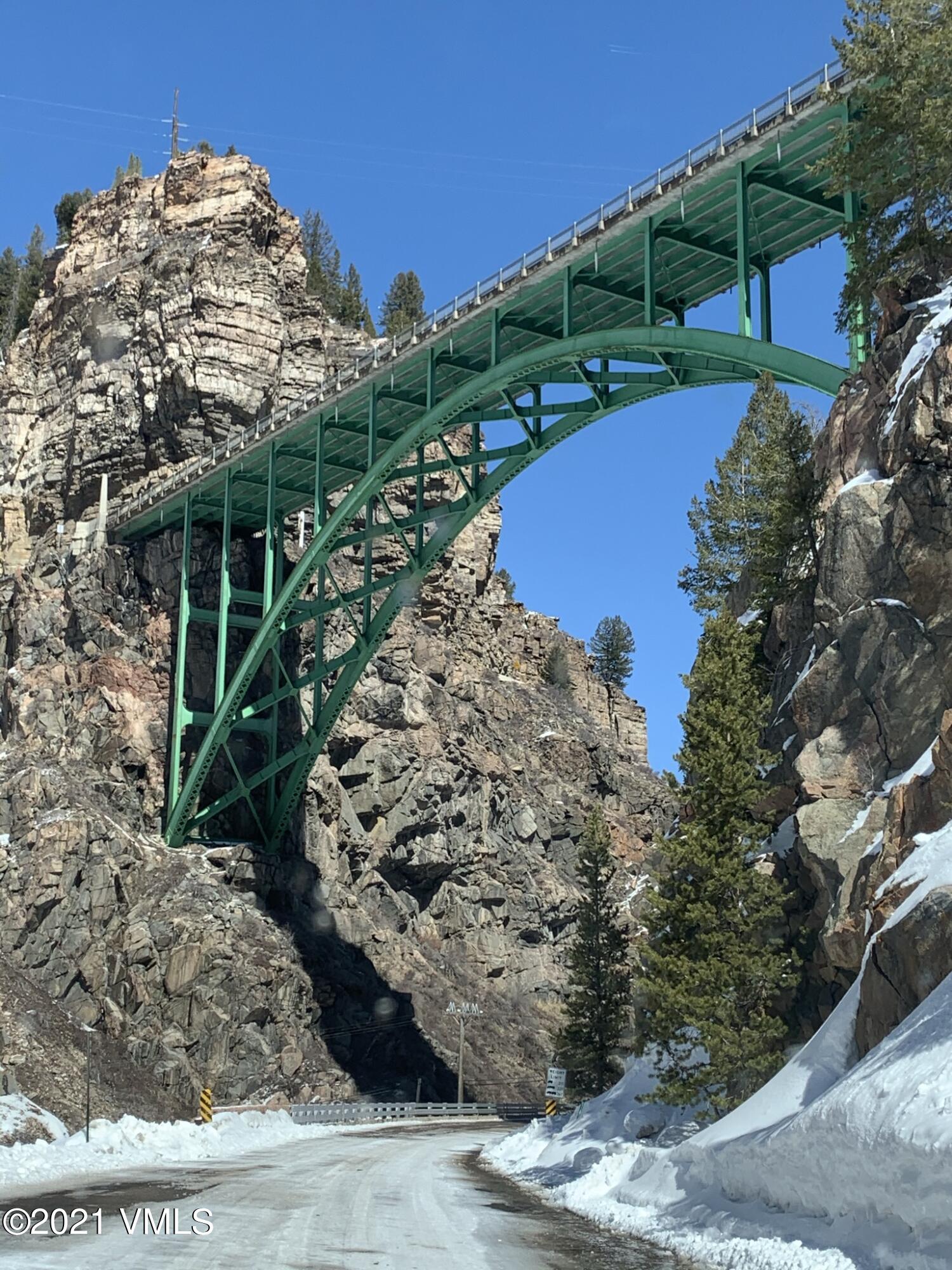 497 Eagle Street Red Cliff, CO 81649 - Photo 10 of 17 a view of a pathway both side of building