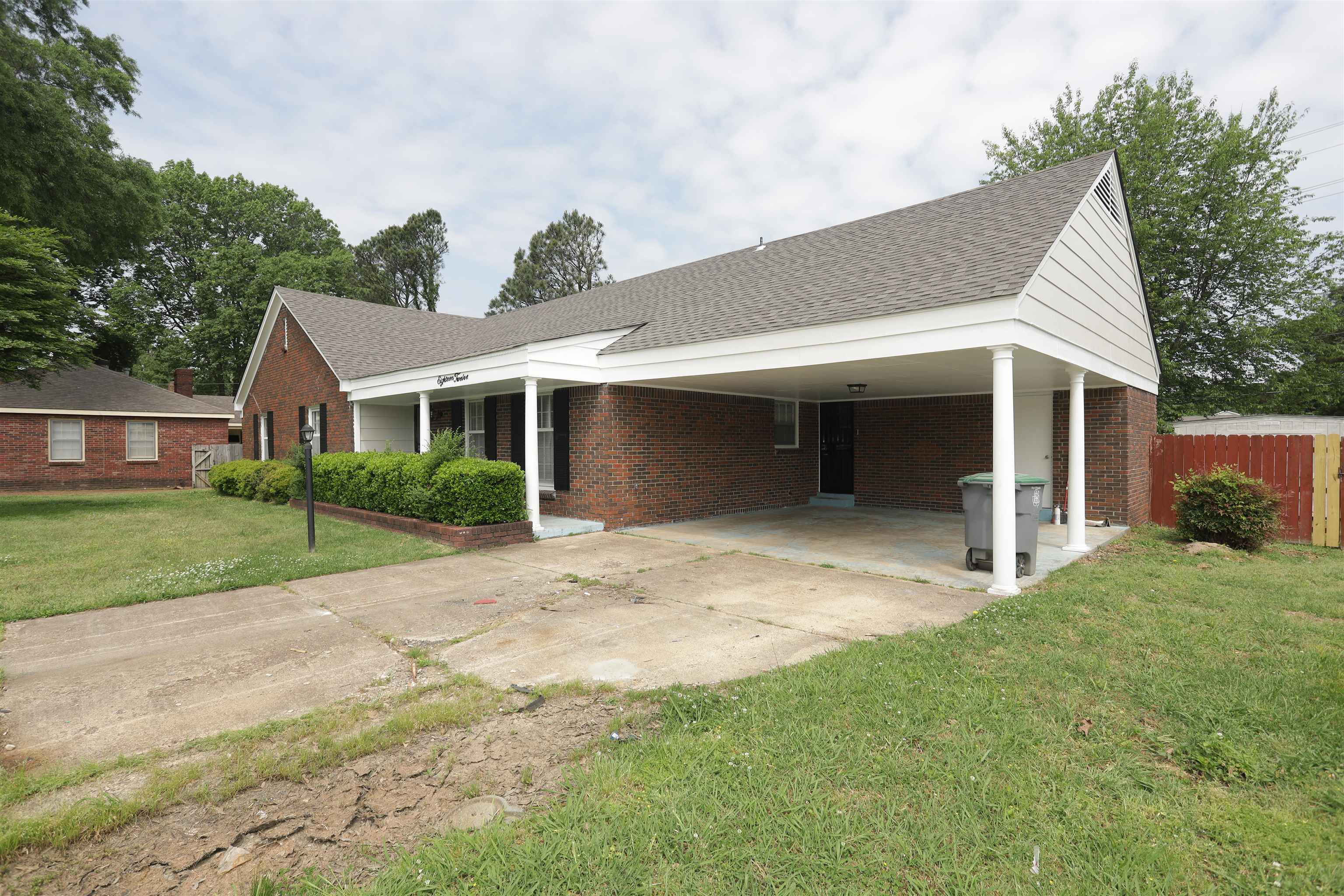 1812 Whitman Road Memphis, TN 38116 - Photo 3 of 18 a view of a yard in front of house