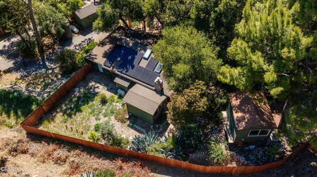 a view of a yard from a balcony