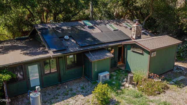a view of a chairs with sign on the wall