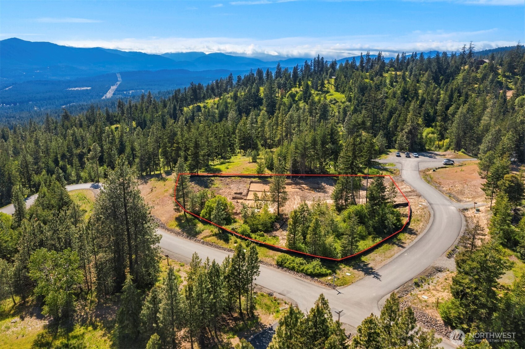 80 Plum Creek Road Cle Elum, WA 98922 - Photo 6 of 20 a view of a swimming pool with a yard and mountain view
