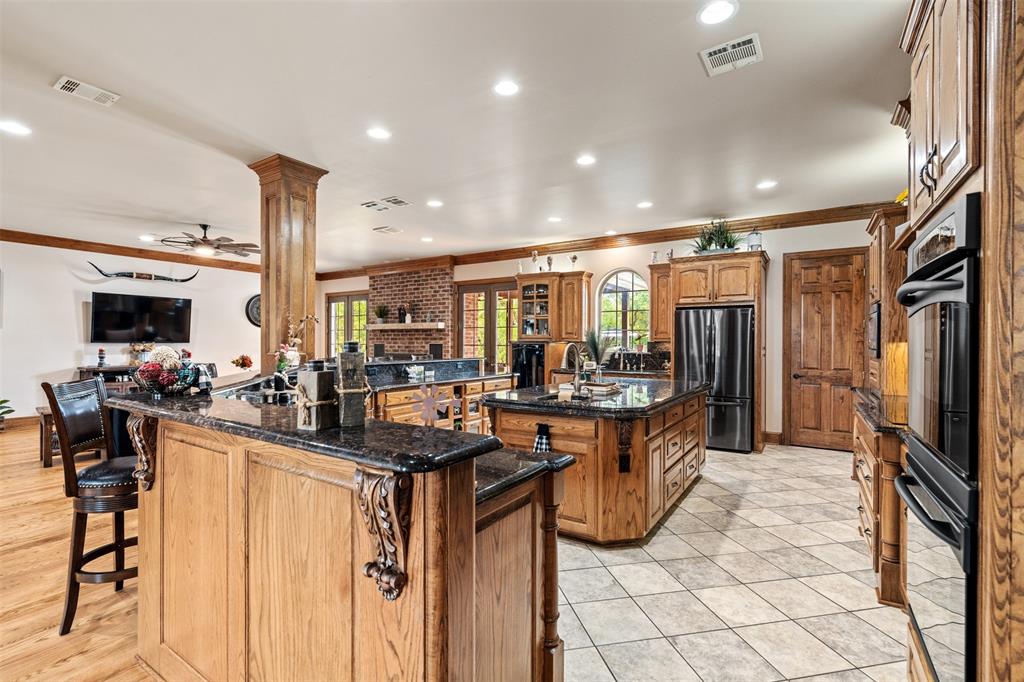 145 County Road 2327 Decatur, TX 76234 - Photo 10 of 40 This well appointed kitchen features beautiful woodwork and everything the chef in your life desires.