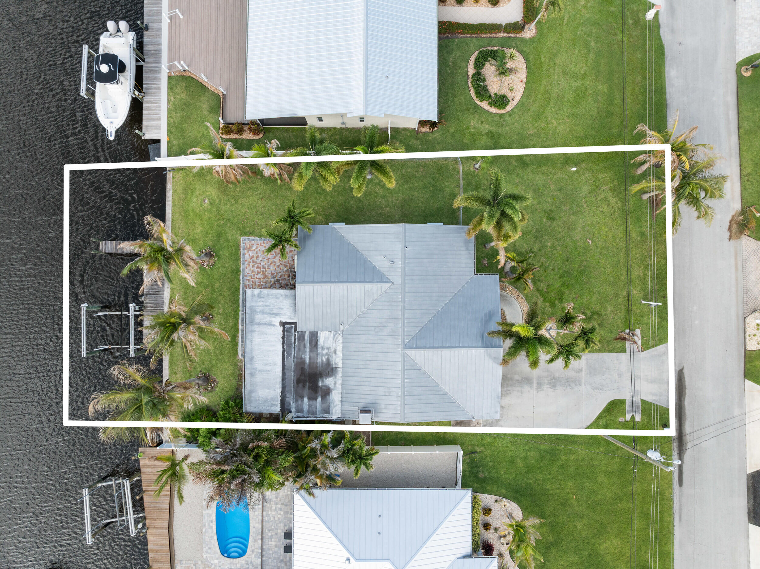 1459 Southwest Seahawk Way Palm City, FL 34990 - Photo 26 of 43 an aerial view of a house with a yard