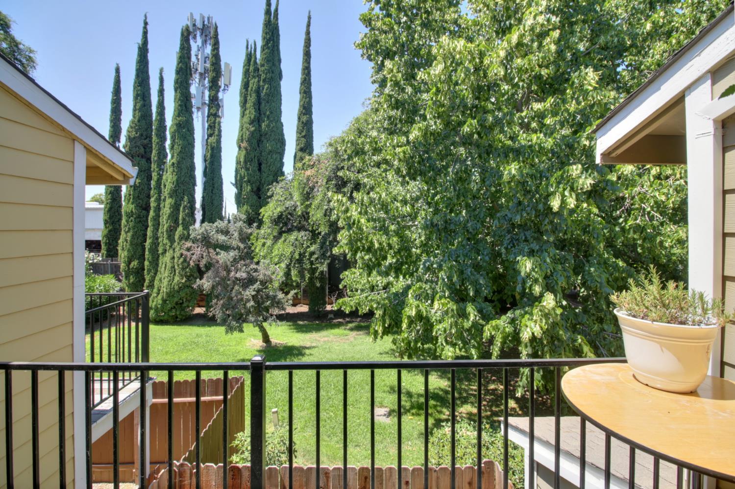 a view of a balcony with an outdoor space