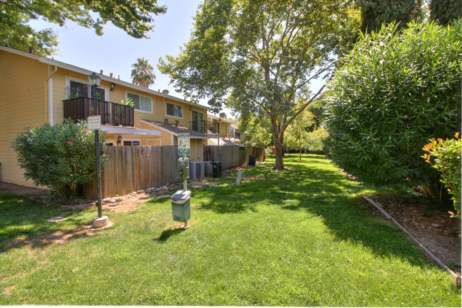 6114 Shadow Lane Citrus Heights, CA 95621 - Photo 20 of 56 a backyard of a house with lots of green space