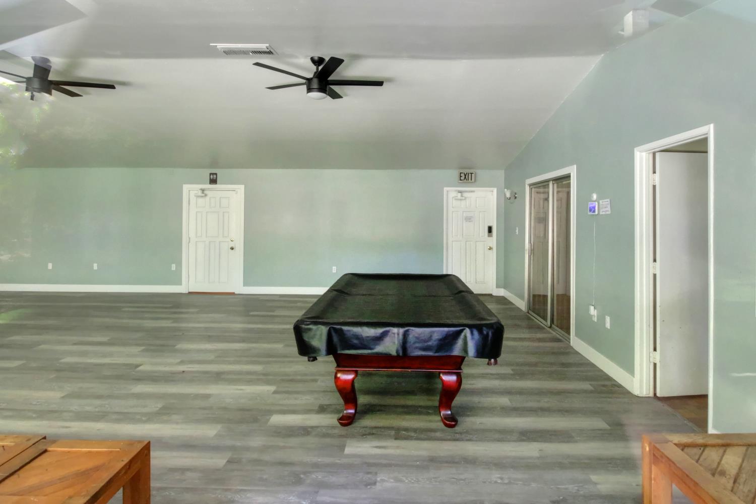 6114 Shadow Lane Citrus Heights, CA 95621 - Photo 28 of 56 a living room with a bed furniture and a wooden floor