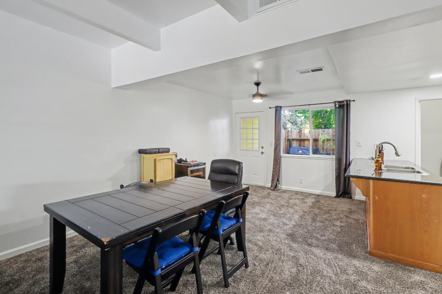6114 Shadow Lane Citrus Heights, CA 95621 - Photo 37 of 56 a view of a kitchen with a table and chairs