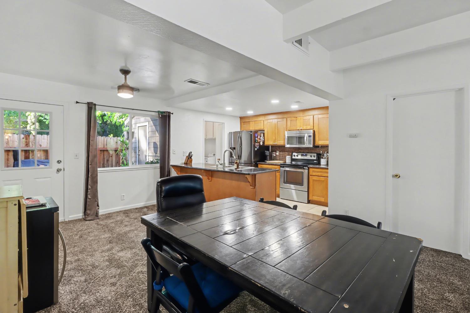 6114 Shadow Lane Citrus Heights, CA 95621 - Photo 38 of 56 a kitchen with granite countertop a stove and white cabinets