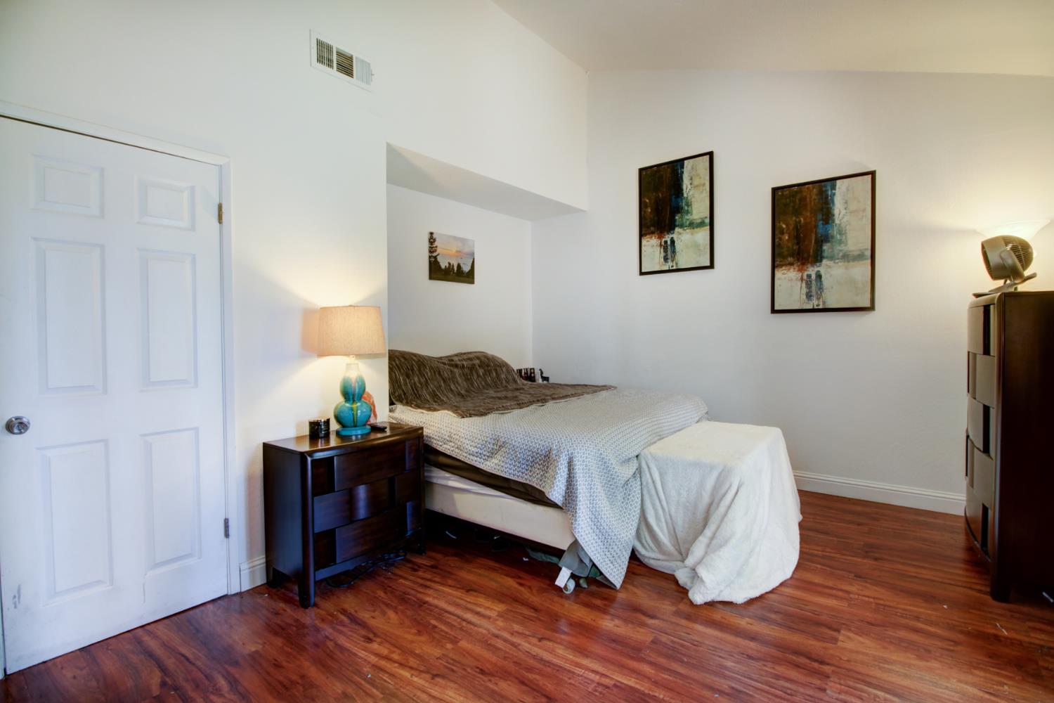 6114 Shadow Lane Citrus Heights, CA 95621 - Photo 4 of 56 a bedroom with a bed and a table