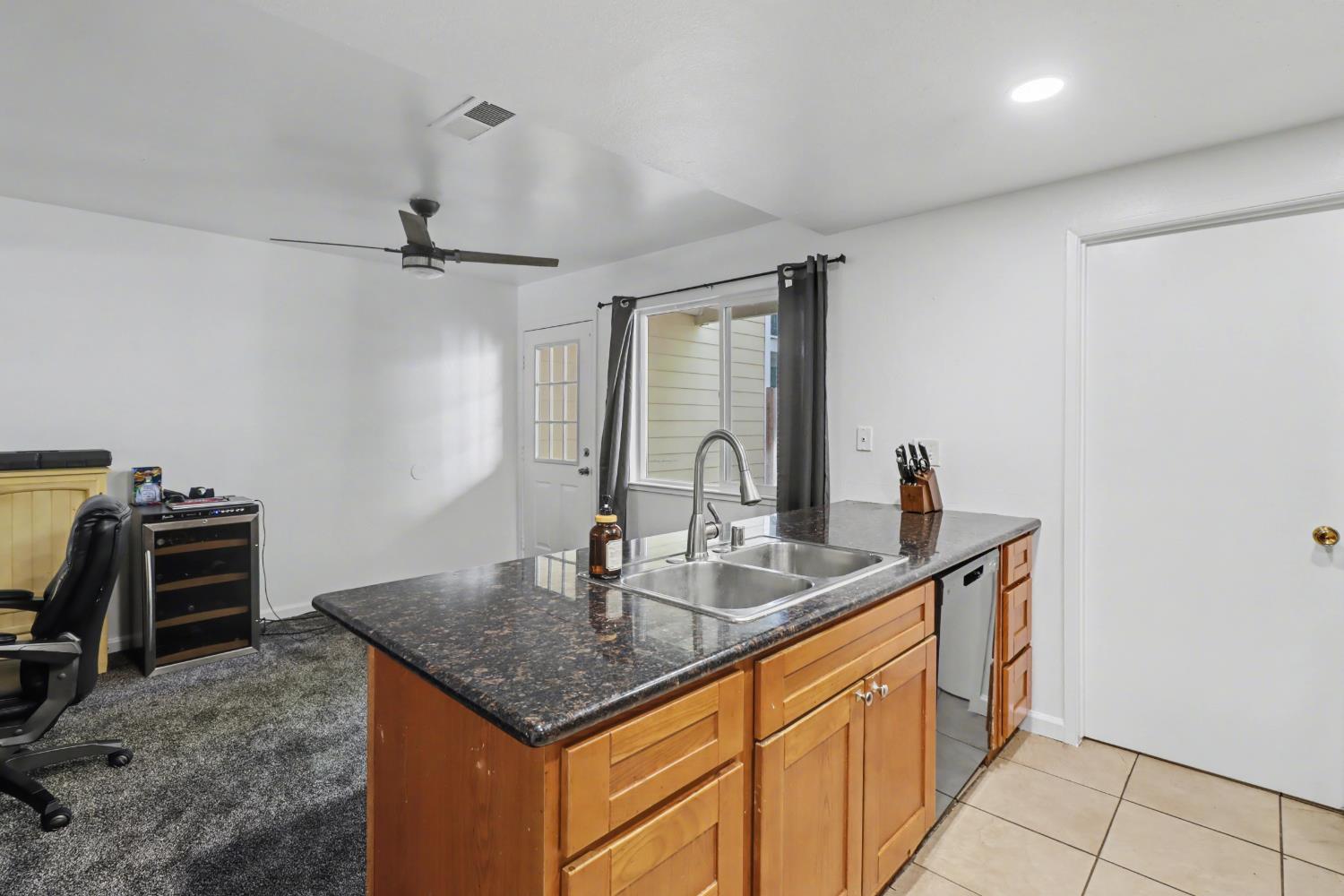 6114 Shadow Lane Citrus Heights, CA 95621 - Photo 44 of 56 a kitchen with a sink and cabinets