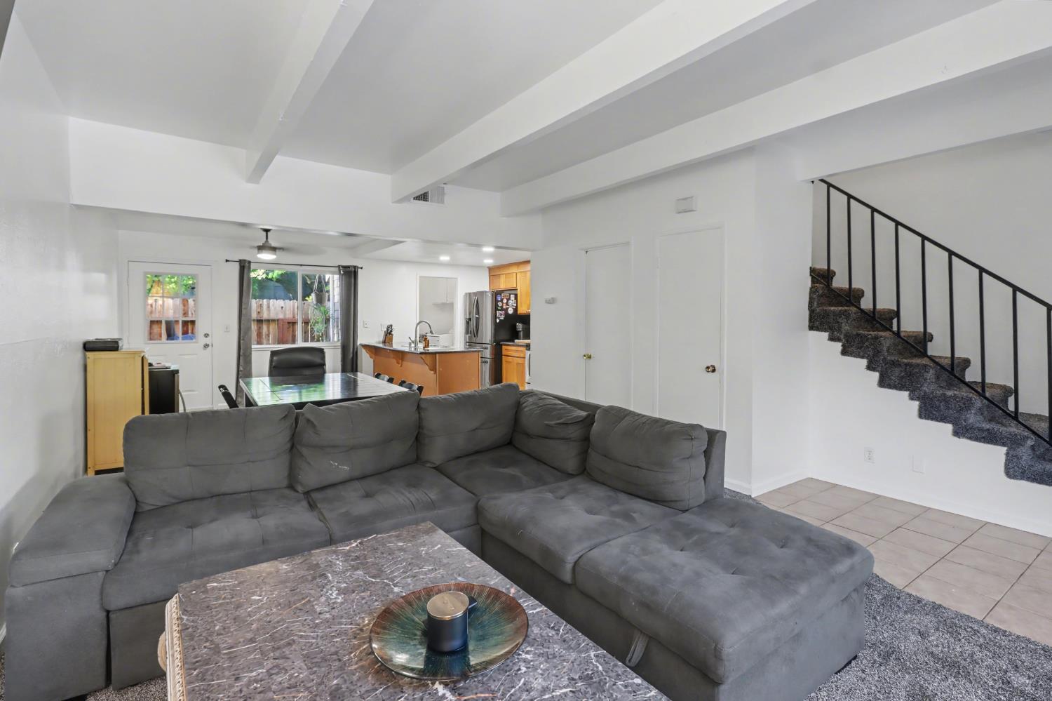 6114 Shadow Lane Citrus Heights, CA 95621 - Photo 46 of 56 a living room with furniture and a chandelier