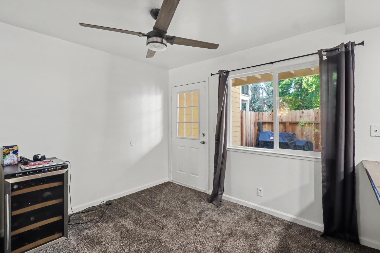6114 Shadow Lane Citrus Heights, CA 95621 - Photo 47 of 56 a view of room with hardwood floor and a ceiling fan