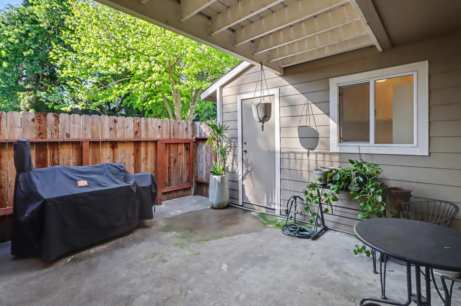 6114 Shadow Lane Citrus Heights, CA 95621 - Photo 49 of 56 a view of a backyard with chairs and potted plants