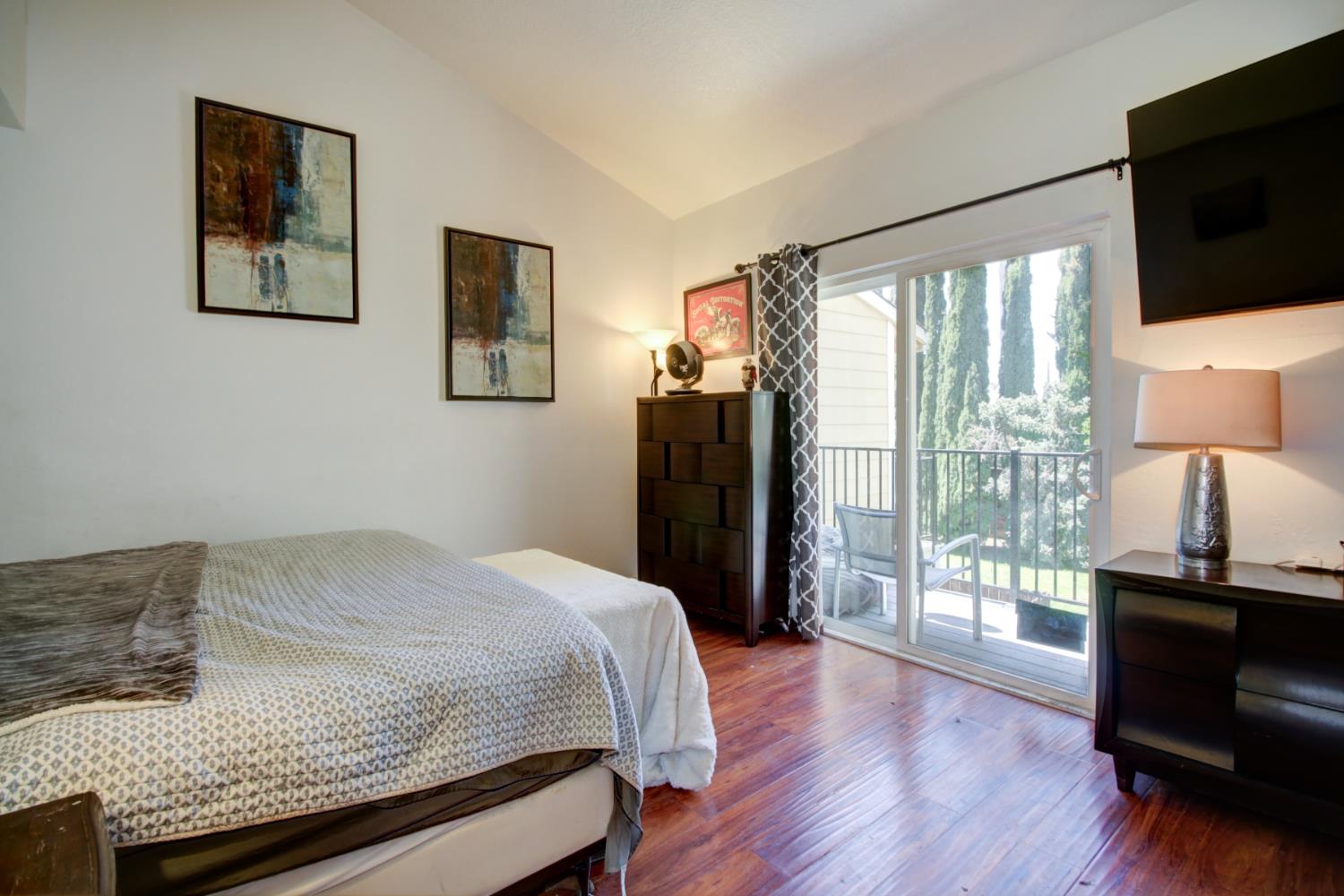 6114 Shadow Lane Citrus Heights, CA 95621 - Photo 5 of 56 a bedroom with a bed and a flat screen tv