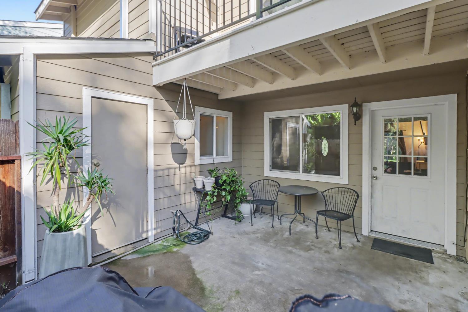 6114 Shadow Lane Citrus Heights, CA 95621 - Photo 52 of 56 a view of a patio with table and chairs and potted plants