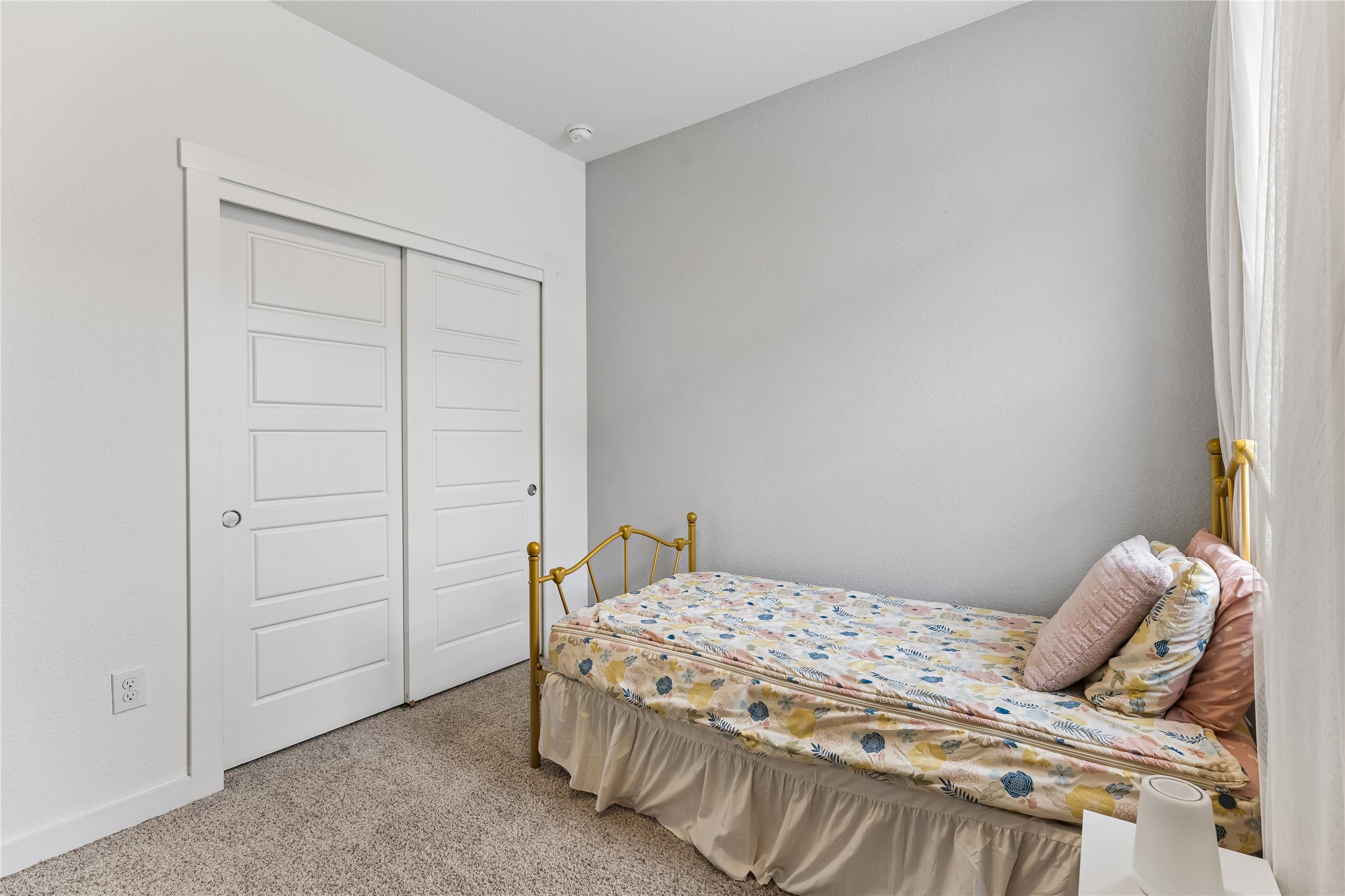 249 Century Plant Road Leander, TX 78641 - Photo 16 of 22 a bedroom with a bed and a window