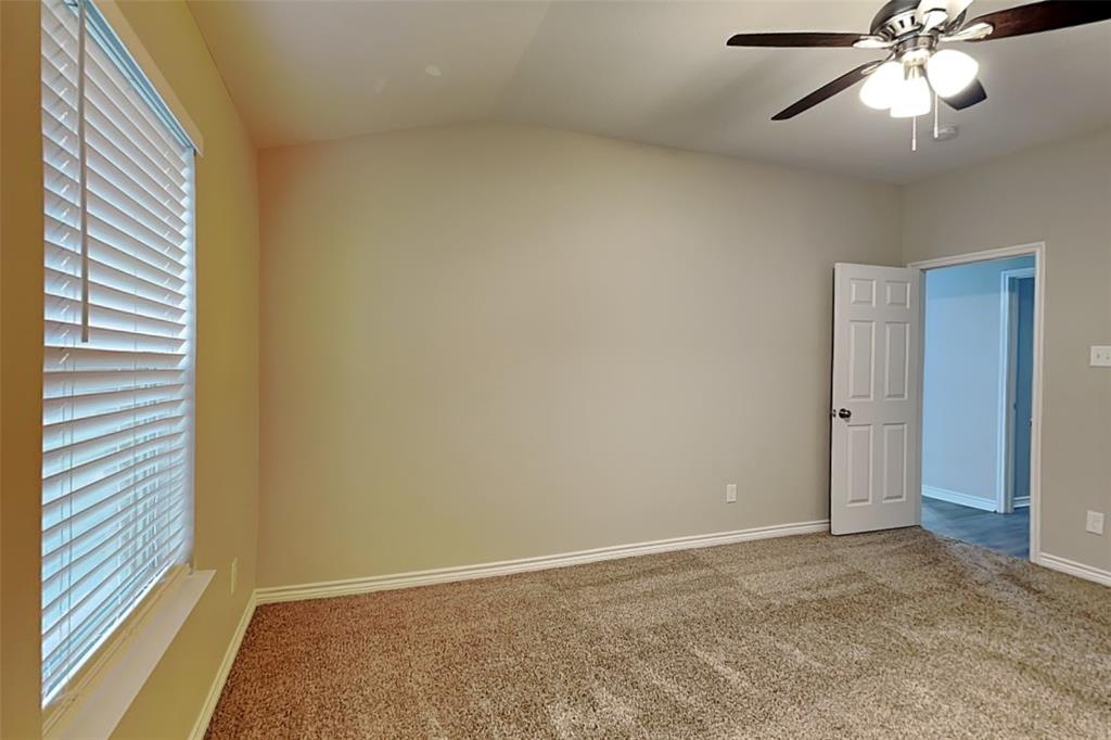 105 Independence Trail Forney, TX 75126 - Photo 10 of 18 a view of an empty room and chandelier fan