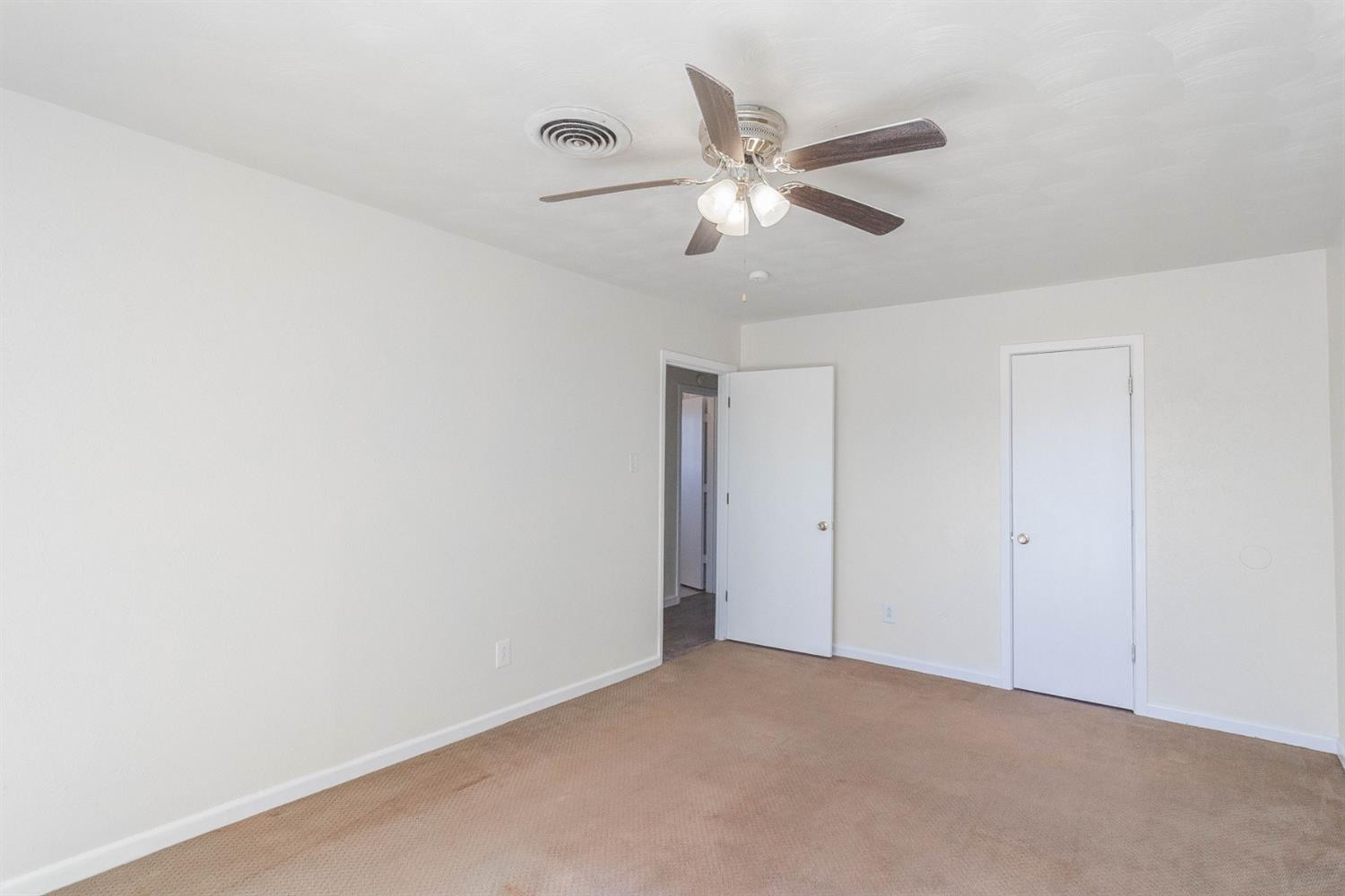 3221 33rd Street, Unit A Lubbock, TX 79410 - Photo 11 of 11 a view of an empty room