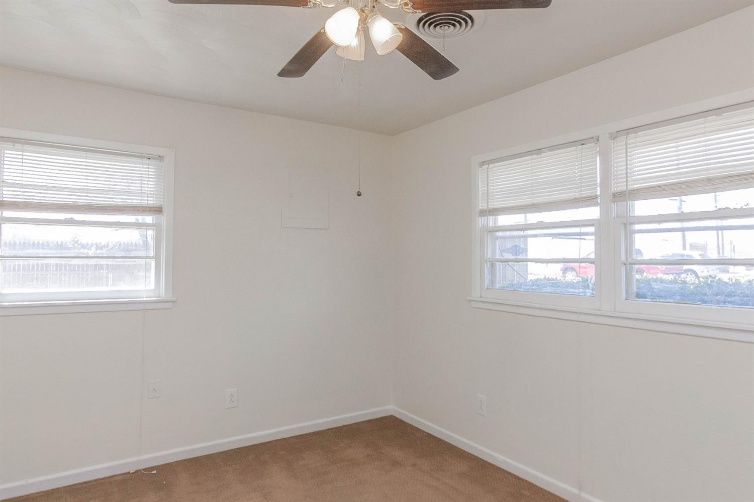 3221 33rd Street, Unit A Lubbock, TX 79410 - Photo 8 of 11 an empty room with a window
