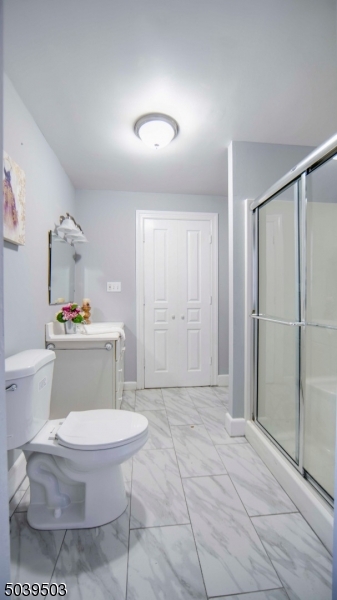 11 Hendrickson Road Lawrence Township, NJ 08648 - Photo 12 of 24 a bathroom with a toilet and a shower