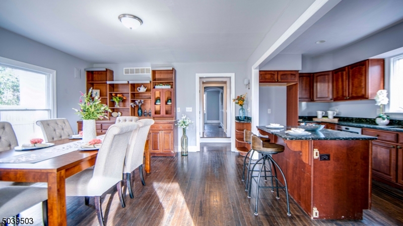 11 Hendrickson Road Lawrence Township, NJ 08648 - Photo 16 of 24 a living room with furniture a wooden floor and a window
