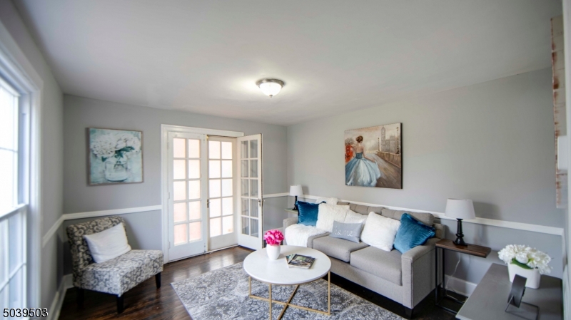 11 Hendrickson Road Lawrence Township, NJ 08648 - Photo 6 of 24 a living room with furniture and a window