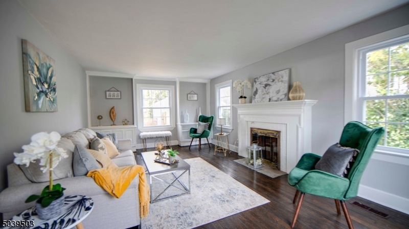 11 Hendrickson Road Lawrence Township, NJ 08648 - Photo 9 of 24 a living room with furniture fireplace and window