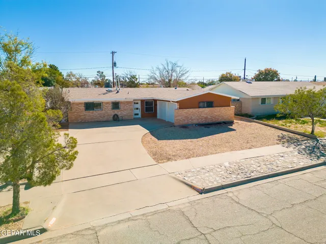 an aerial view of a building with outdoor space