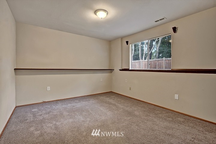 2905 165th Place Southeast Bothell, WA 98012 - Photo 16 of 18 an empty room with a window
